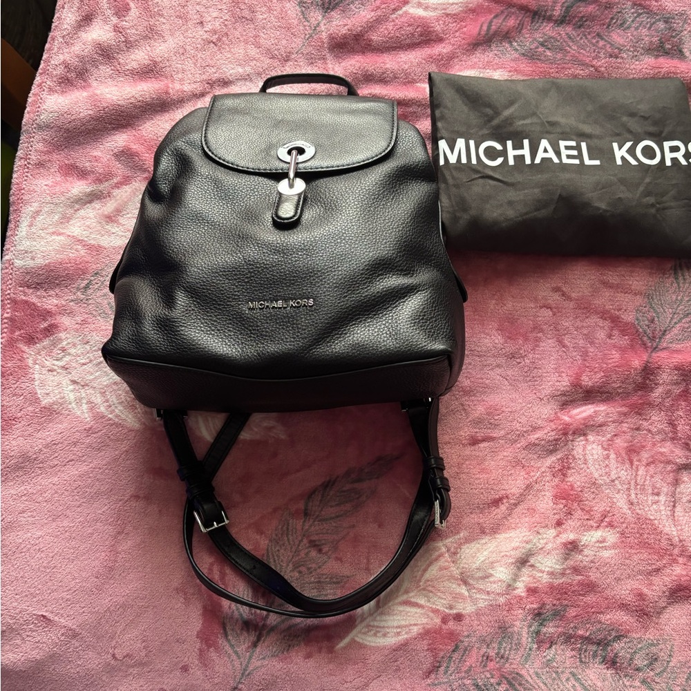 Michael Kors Black Backpack with Pebbled Leather and Flap Closure